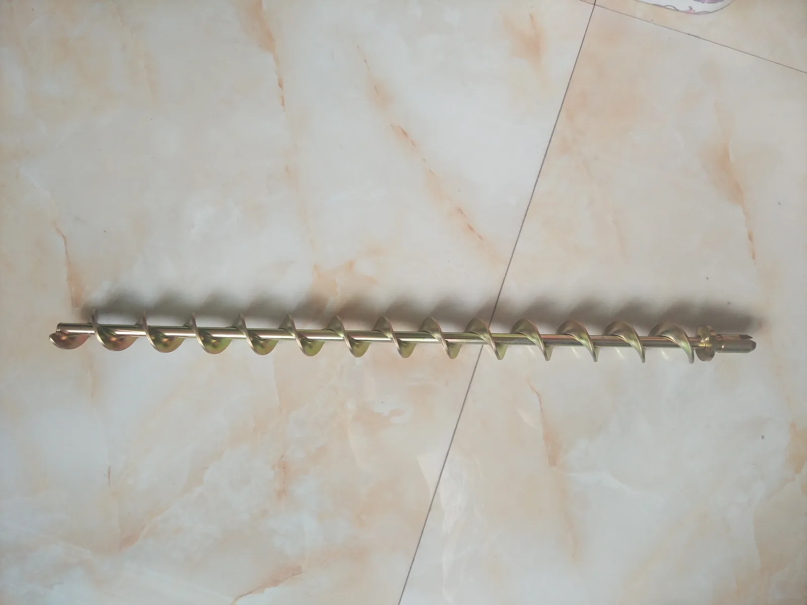 Finished shafted auger with drive-end details