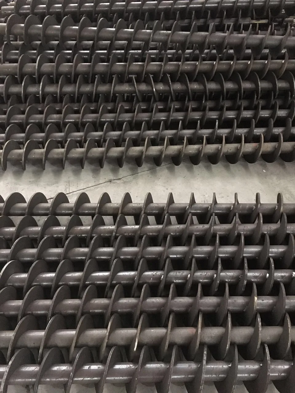 Shafted auger assemblies prepared in the workshop
