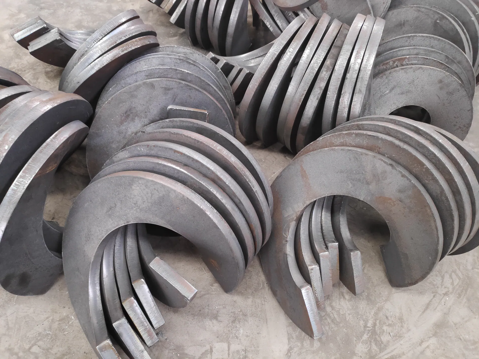 Sectional screw flights prepared for manufacturing review