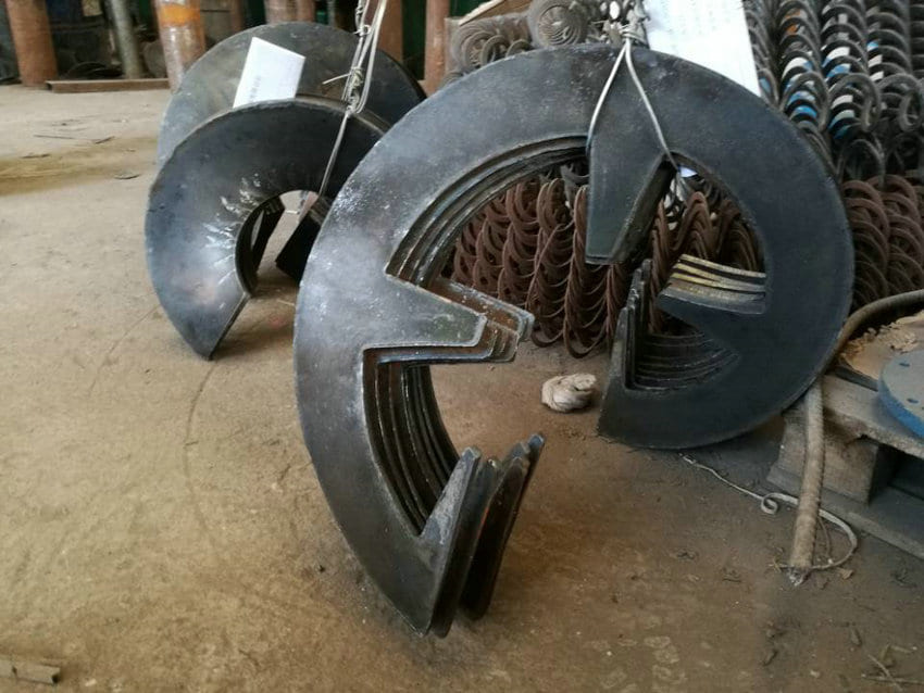 Sectional spiral blade with precision-formed helical profile