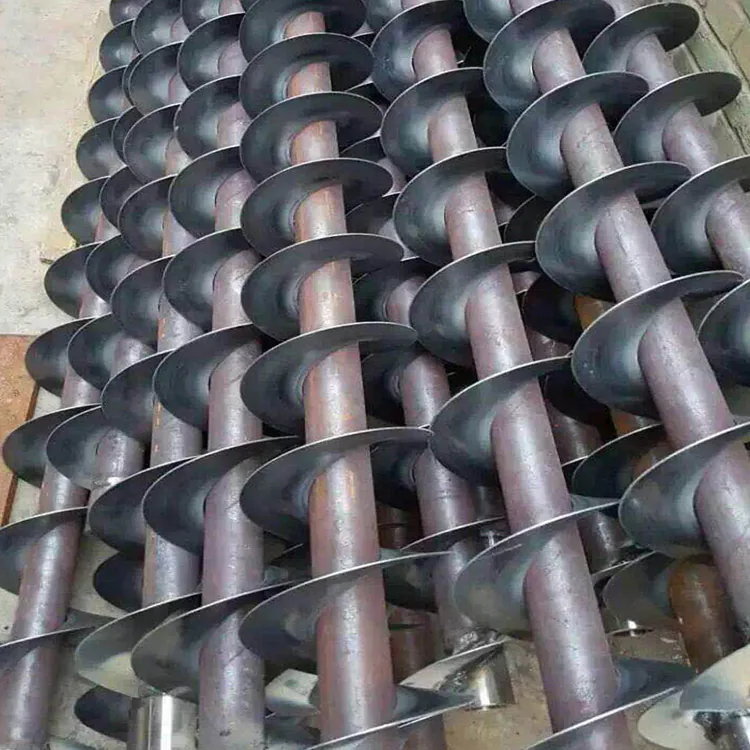 Custom fabricated auger screw assemblies featuring precision screw flight components