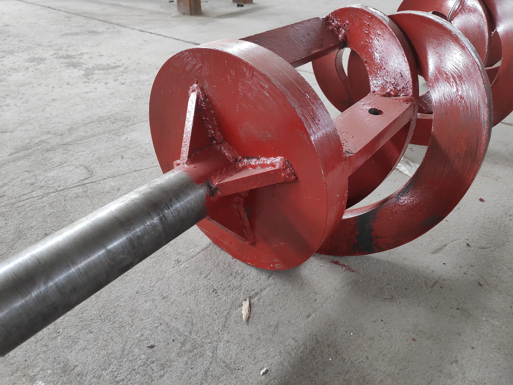Multiple auger screw assemblies with integrated shafts and helical flight sections Multiple auger screw assemblies with integrated shafts and helical flight sections