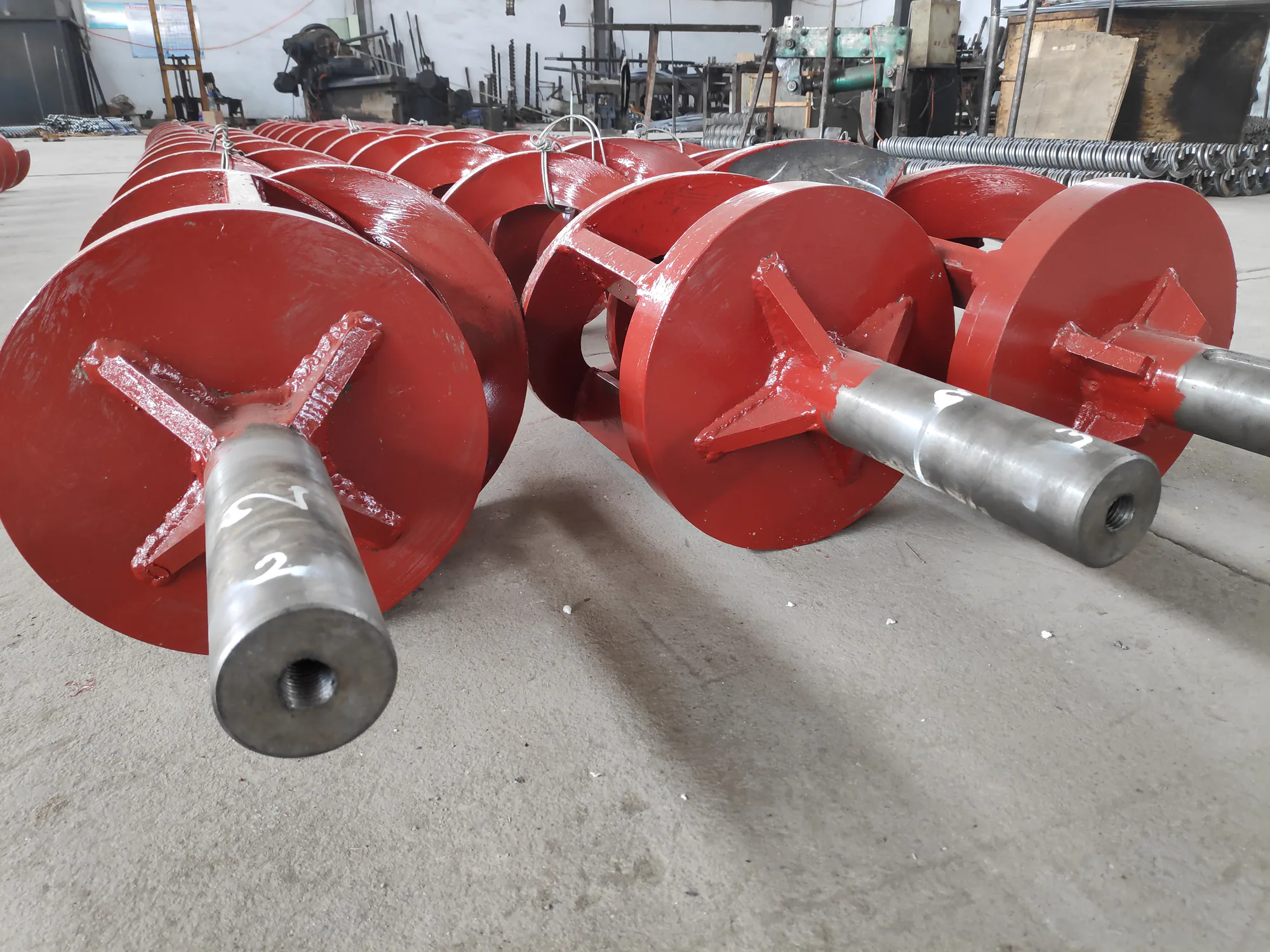 Heavy-duty helical auger assemblies with custom welded screw flights Heavy-duty helical auger assemblies with custom welded screw flights