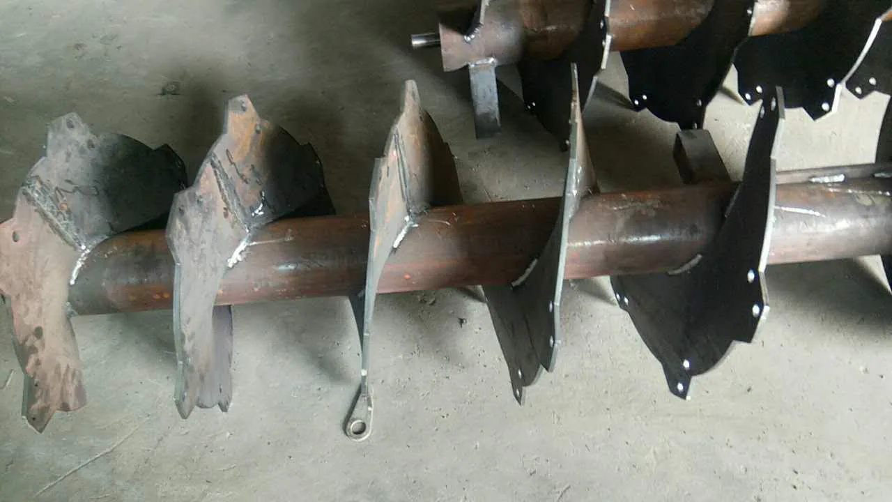 Industrial vertical auger assembly manufactured with custom screw flight components Industrial vertical auger assembly manufactured with custom screw flight components
